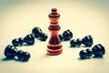 Red burning Queen and many fallen pawns - chess concept Royalty Free Stock Photo