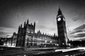Red bus, Big Ben and Westminster Palace in London, the UK. at night. Black and white Royalty Free Stock Photo