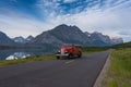 Red Bus in front of Red Eagle Mountain