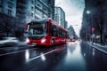 Red bus on the road in the city at night, motion blur