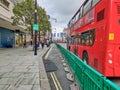 A red bus travelling down Oxford Circus Royalty Free Stock Photo