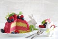 Red buttercream cake with blueberries and raspberriesto easter Royalty Free Stock Photo