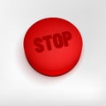 Red button with STOP text on gray background