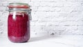 Red cabbage in a ferment jar with copy space Royalty Free Stock Photo