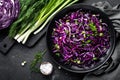 Red cabbage salad with fresh green onion and dill. Vegetarian dish Royalty Free Stock Photo