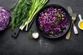 Red cabbage salad with fresh green onion and dill. Vegetarian dish Royalty Free Stock Photo