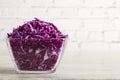 Red cabbage salad with fresh green onions dill and sprouted mung beans on a white background. Vegetarian dish. Top view. Concept o Royalty Free Stock Photo