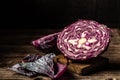 Red cabbage on vintage wooden background. The texture of the cut cabbage, place for text Royalty Free Stock Photo