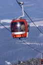 Red cabin lift in the mountains Royalty Free Stock Photo