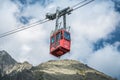 TATRANSKA LOMNICA, SLOVAKIA, AUGUST 2020 - Red cabin of cableway from Skalnate pleso to peak Lomnicky Stit in High Royalty Free Stock Photo