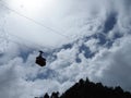 Red cable car in the background of the mountains Old red cable car at mountain Royalty Free Stock Photo