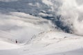 Red cable car descend from mountain peak Royalty Free Stock Photo