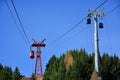 Red cable car and gondola ride transportation at 2000m in Bucegi Mountains, Romania Royalty Free Stock Photo