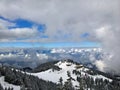 Red cable car over the forest covered with snow Royalty Free Stock Photo