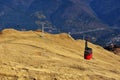 Red cable car transportation at 2000m in Bucegi Mountains, autumn season, Sinaia, Romania