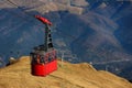 Red cable car transportation at 2000m in Bucegi Mountains, autumn season, Sinaia, Romania Royalty Free Stock Photo