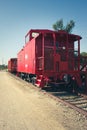 Red caboose parked at Katy Depot train museum.