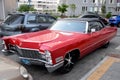Red Cadillac in the yard