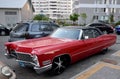 Red Cadillac in the yard