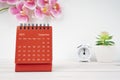 The Red calendar September 2023. Desk calendar for year 2023 and pink color orchid
