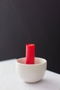 Extinguished red candle with smoke Royalty Free Stock Photo