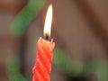 Red candle lit to celebrate a very important event Royalty Free Stock Photo