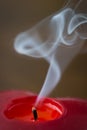 Red candle with smoke Royalty Free Stock Photo