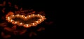 Red candles are arranged in the shape of a heart Royalty Free Stock Photo