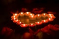 Red candles are arranged in the shape of a heart Royalty Free Stock Photo