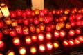 red candles lit during the religious rite inside the place of worship Royalty Free Stock Photo