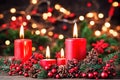 Red candles and red plant fruits for festive holiday celebration