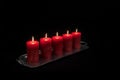 Red candles in a row burning Royalty Free Stock Photo