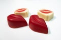 Red candy chocolate kisses on white background. Royalty Free Stock Photo