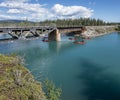 Red Canoes on the Kananaskis River near Exshaw Royalty Free Stock Photo