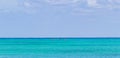 Red canoes on the sea panorama Playa del Carmen Mexico