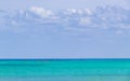 Red canoes on the sea panorama Playa del Carmen Mexico