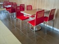 Red canteen diner chairs and tables Royalty Free Stock Photo