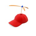 Red cap with toy propellers Royalty Free Stock Photo