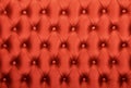 Red capitone tufted fabric upholstery texture