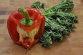 Red Capsicum on Wood Chopping Board