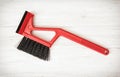 Red car brush with scraper Royalty Free Stock Photo