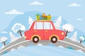 Red car with Christmas gifts is driving on the road. Winter background with auto, road, trees, fir trees.