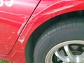 Red car with damage Royalty Free Stock Photo