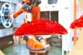 Red car disc brake caliper presented on acrylic glass