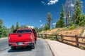 Red car discovering National Park, USA Royalty Free Stock Photo