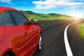 Red car driving by autobahn Royalty Free Stock Photo