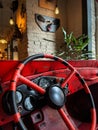 Red car interior with steering wheel and dashboard Royalty Free Stock Photo