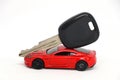 Red car with key with. Royalty Free Stock Photo