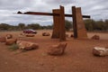 Red Car on Red Centre Way in Outback Australia Royalty Free Stock Photo