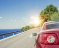 Red car rushing along a high-speed highway. Royalty Free Stock Photo